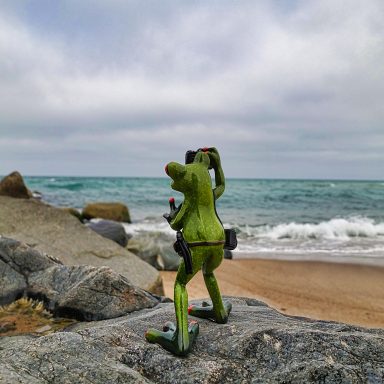 Robert fotografiert am Strand